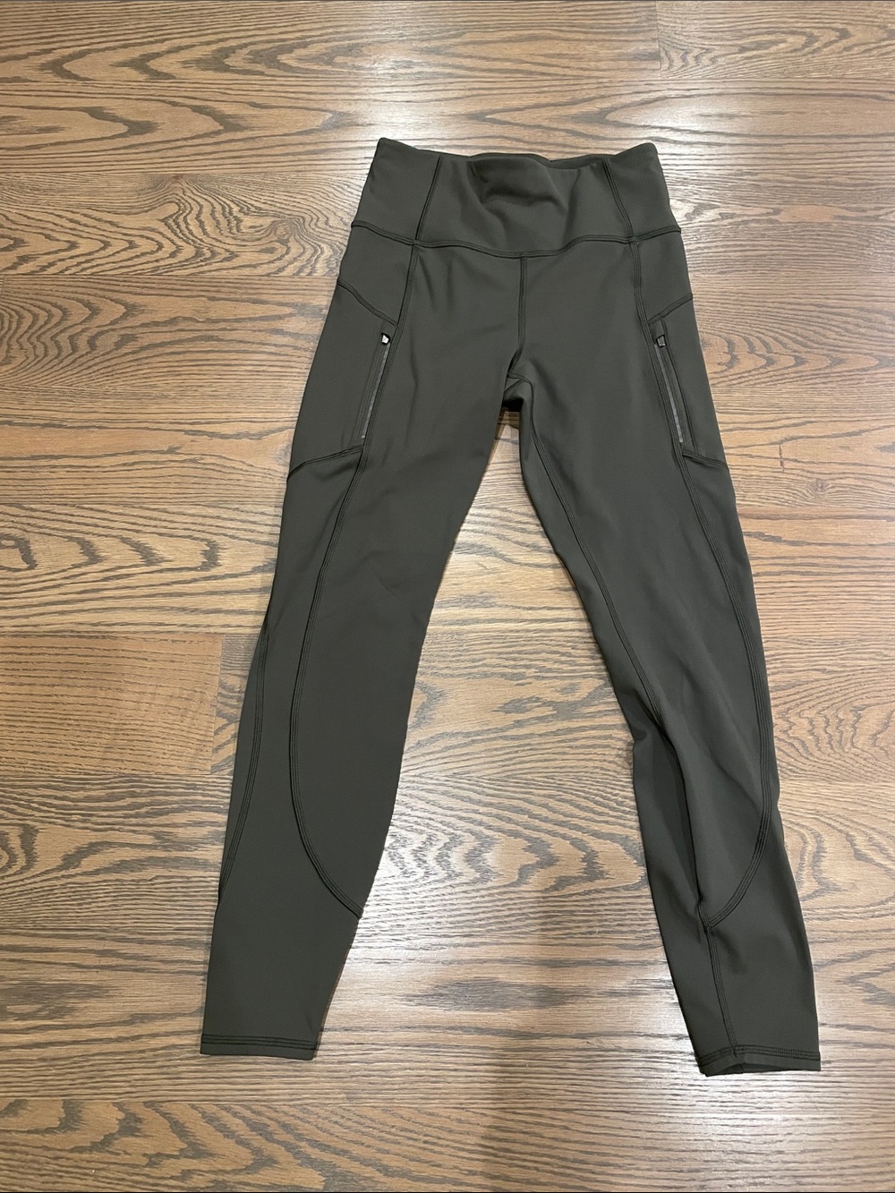 Athleta Rainier Olive Green Performance Leggings with Zippered Side Pockets